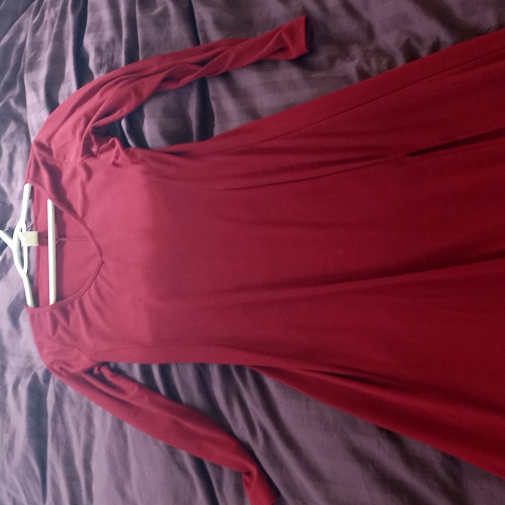 Long crimson red dress. Comfortable, front leg slit on the left. Long sleeve.